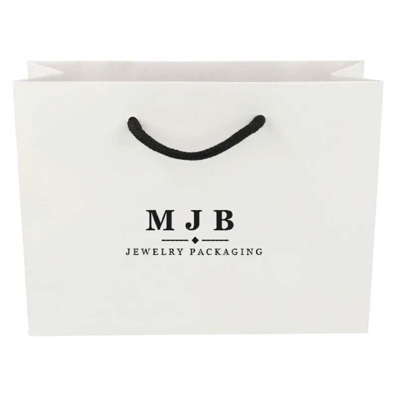 Bolsa de papel mate blanca con asa de cordón negro para joyería y bisutería, logotipo MJB - BPM200BN 200 x 150 x 70 mm