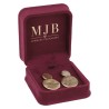 Open burgundy velvet jewellery box CHA2P-BU holding a pair of drop earrings, gold MJB logo inside the lid
