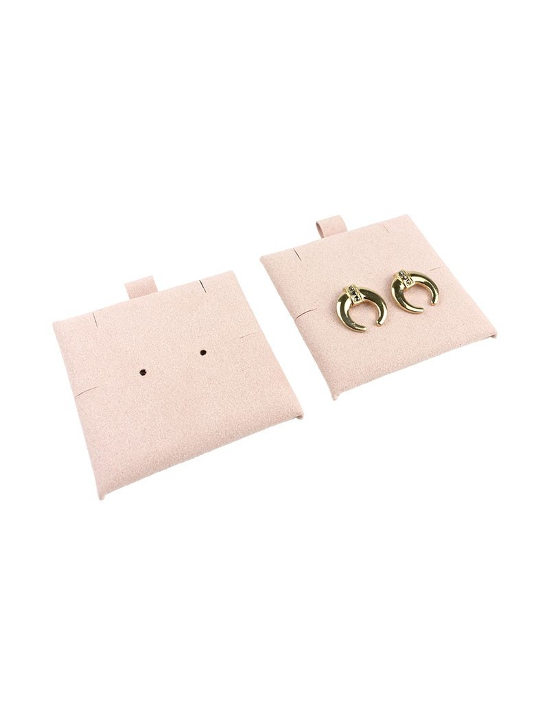 Tacos de microfibra en color rosa empolvado con ranuras y agujeros para sujetar pendientes y colgante