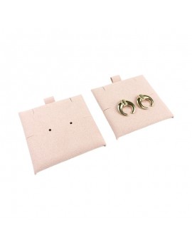 Tacos de microfibra en color rosa empolvado con ranuras y agujeros para sujetar pendientes y colgante