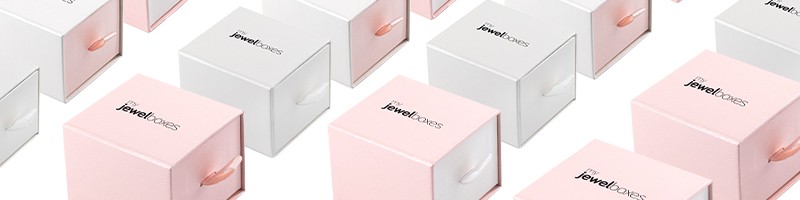 Cardboard boxes with a small drawer-style handle for jewellery and watches
